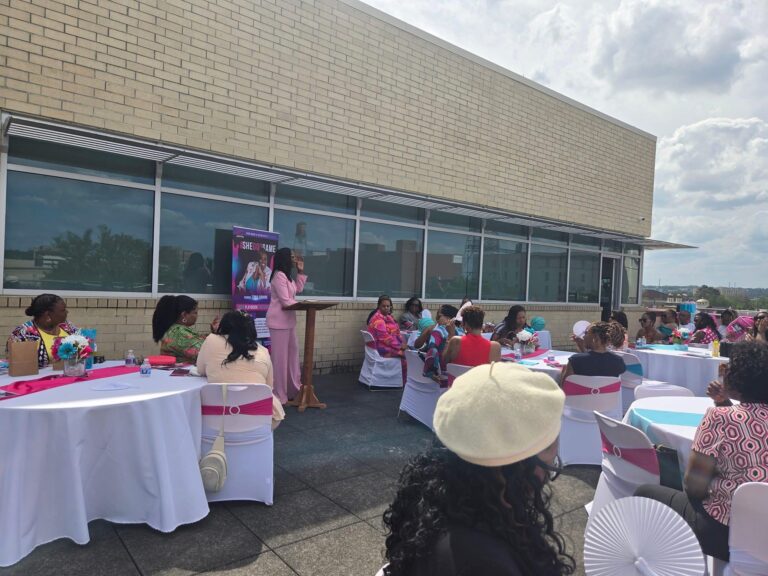 She got game event photo wide shot with speaker